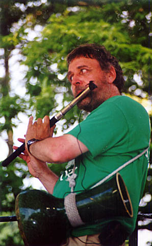 Bernard playing flute.